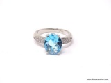 .925 STERLING SILVER LADIES 4 CT BLUE TOPAZ RING. SIZE 8.