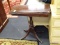 MAHOGANY GAME TABLE WITH DUNCAN PHYFE BASE AND BRASS CAPPED CLAW FEET. MEASURES 29 IN X 14.5 IN X 29