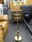 BRASS FLOOR LAMP WITH 3 ARM LIGHTS AND 1 CENTER LIGHT. MEASURES 51 IN TALL. ITEM IS SOLD AS IS WHERE