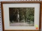 FRAMED PHOTOGRAPH OF POSSIBLY COLONIAL ERA RUINS. IS IN AN OAK FRAME AND MEASURES 15 IN X 12 IN.