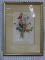 FRAMED FLORAL PRINT WITH A BOUQUET OF FLOWERS IN RED, BLUE, PINK, AND GREEN. IN A GOLD TONED FRAME