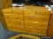 8 DRAWER MAPLE DRESSER WITH MAPLE KNOB STYLE PULLS. MEASURES 52 IN X 15 IN X 32 IN. ITEM IS SOLD AS