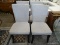 SET OF 4 MODERN DINING CHAIRS WITH GRAY UPHOLSTERY, BLACK PIPING EDGES, AND ESPRESSO COLORED LEGS.