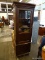 MAHOGANY STORAGE CABINET WITH 2 INTERIOR SHELVES (HAVE SLOTS FOR GLASS), AN INTERIOR STORAGE AREA,
