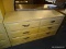 DRESSER WITH 6 DRAWERS AND BLACK PAINTED HANDLES. MEASURES 56 IN X 19 IN X 30 IN. SOLD AS IS, WHERE