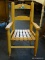 CHILDS LADDER BACK AND SLAT BOTTOM CHAIR WITH PAINTED WINNIE THE POOH ACCENT ON THE CREST. MEASURES