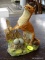CROWN STAFFORDSHIRE FIGURINE OF A WEASEL. MEASURES 4 IN X 3 IN X 5.5 IN. ITEM IS SOLD AS IS WHERE IS