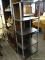 BLACK AND GRAY SHELVING UNIT WITH 5 SHELVES. MEASURES 23.5 IN X 15.5 IN X 60 IN. SOLD AS IS, WHERE