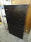 BLACK TALL CHEST WITH 5 DRAWERS AND BLACK PAINTED KNOB STYLE PULLS. MEASURES 26.5 IN X 15 IN X 47.5