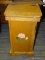 WOODEN TRASH CAN WITH LIFT-LID AND A FLORAL PAINTED FRONT. MEASURES 15.5 IN X 14 IN X 29 IN. SOLD AS