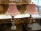 PAIR OF MODERN RED AND SILVER TONED LAMPS WITH MATCHING SHADES AND FERN STYLE FINIALS. EACH MEASURES