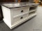 MODERN ENTERTAINMENT STAND WITH 2 DRAWERS AND 2 SIDE STORAGE AREAS. MEASURES 48 IN X 18 IN X 18 IN.