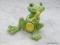 GOEBEL FIGURINE OF A FROG PLAYING SAXOPHONE. #33134. MEASURES 3.5 IN TALL. ITEM IS SOLD AS IS WHERE