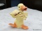 GOEBEL FIGURINE OF A DUCK PLAYING FLUTE. #33 13534. MEASURES 5 IN TALL. ITEM IS SOLD AS IS WHERE IS