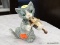 GOEBEL FIGURINE OF A CAT PLAYING VIOLIN. #33 132. MEASURES 4.5 IN TALL. ITEM IS SOLD AS IS WHERE IS