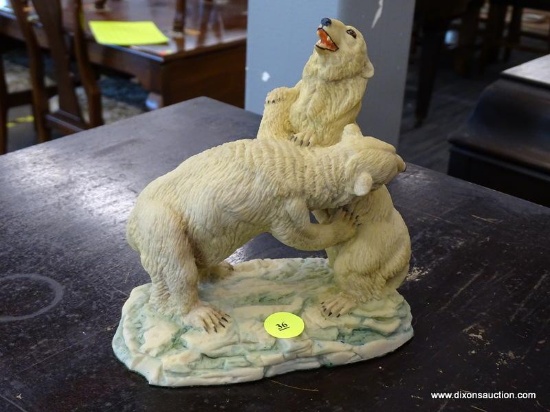 CROWN STAFFORDSHIRE FIGURINE OF A PAIR OF FIGHTING POLAR BEARS. MEASURES 6 IN X 4 IN X 6.5 IN. ITEM