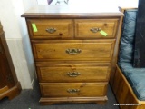 PINE 4 DRAWER TALL CHEST WITH BRASS CHIPPENDALE STYLE PULLS. MEASURES 32 IN X 18 IN X 42 IN. ITEM IS