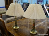 PAIR OF BRASS LAMPS WITH PLEATED PAPER SHADES AND BRASS FINIALS. HAVE PULLSTRING STYLE SWITCHES.