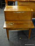 KENT-COFFEY MID-CENTURY MODERN NIGHTSTAND WITH AN UPPER DRAWER AND METAL HANDLES ON THE DRAWER.