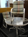 PATIO TABLE AND 2 CHAIRS IN WHITE. INCLUDES A ROUND WHITE METAL AND PLEXIGLASS TOP PATIO TABLE