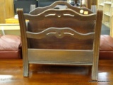 MAHOGANY MAGAZINE HOLDER WITH PIERCED SIDES. MEASURES 17 IN X 11.5 IN X 19 IN. ITEM IS SOLD AS IS