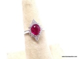 18K WHITE GOLD RUBY & DIAMOND RING. THE RING IS MOUNTED WITH 1 GENUINE NATURAL RUBY CENTER STONE