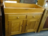 ANTIQUE SOLID PINE DOVETAILED DRYSINK WITH 2 DRAWERS OVER 2 DOORS. MEASURES 41 IN X 19 IN X 35 IN.