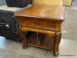 KLAUSNER MAHOGANY 1 DRAWER END TABLE WITH LOWER SHELF AND BANDED TOP. MEASURES 24 IN X 28 IN X 23