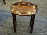 BUTLER STYLE END TABLE WITH DROPSIDE HANDLES. 1 HANDLE HAS BEEN REPAIRED. MEASURES 17 IN X 13.5 IN X
