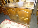 MAHOGANY SERVER WITH 2 DOORS WITH PORCELAIN KNOB STYLE PULLS AND 2 INTERIOR SHELVES. MEASURES 36 IN