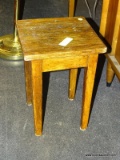 ANTIQUE OAK STOOL. MEASURES 11 IN X 11 IN X 16 IN. SOLD AS IS, WHERE IS, WITH NO GUARANTEE OR