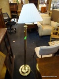 BRASS FLOOR LAMP WITH ADJUSTABLE ARM, CLOTH SHADE AND BRASS HOOP STYLE FINIAL. MEASURES 59 IN TALL.