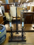 DOUBLE LAMP ON WOODEN BASE WITH WROUGHT IRON BODY AND BRASS HARP & FINIALS. MEASURES 15 IN X 6 IN X