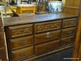 AMERICAN BRAND DRESSER WITH 9 DRAWERS AND BRASS KNOB STYLE PULLS. MEASURES 64 IN X 19 IN X 31 IN.