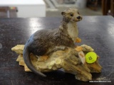 CROWN STAFFORDSHIRE FIGURINE OF AN OTTER. MEASURES 3 IN X 6 IN X 4.5 IN. ITEM IS SOLD AS IS WHERE IS