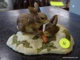 CROWN STAFFORDSHIRE FIGURINE OF A PAIR OF RABBITS. MEASURES 5.5 IN X 3.5 IN X 3 IN. ITEM IS SOLD AS