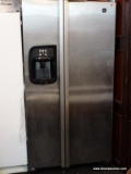 MAYTAG REFRIGERATOR WITH A STAINLESS STEEL DOORS. IS IN WORKING CONDITION. MEASURES 36 IN X 34 IN X