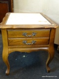 MARBLE TOP COFFEE TABLE WITH WOODEN CENTER AND 2 MARBLE PIECES (1 ON EITHER SIDE). MEASURES 46 IN X