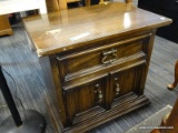 DREXEL NIGHT STAND WITH 1 DRAWER OVER 2 DOORS THAT OPEN TO REVEAL EXTRA STORAGE. MEASURES 26 IN X 18