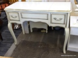 CREAM COLORED VANITY WITH 2 DRAWERS, A LIFT-TOP CENTER WITH MIRROED BACK AND INTERIOR STORAGE, AND