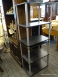 BLACK AND GRAY SHELVING UNIT WITH 5 SHELVES. MEASURES 23.5 IN X 15.5 IN X 60 IN. SOLD AS IS, WHERE