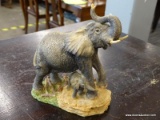 CROWN STAFFORDSHIRE FIGURINE OF AN ELEPHANT. MEASURES 5 IN X 4 IN X 6 IN. ITEM IS SOLD AS IS WHERE