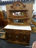 VICTORIAN MARBLE TOP BUFFET WITH 3 DRAWERS OVER 2 DOORS, A CARVED MIRRORED BACK, WHITE MARBLE TOP,