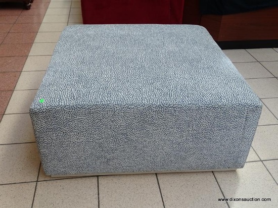 CLAYTON COCKTAIL OTTOMAN BY BARCLAY BUTERA IN THE BLUE SPOT PATTERN. RETAILS FOR $1,335.00 ONLINE.