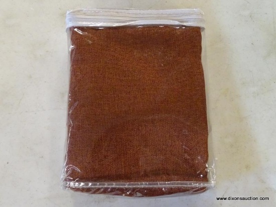 HOME DECORATORS COLLECTION ROOM DARKENING CURTAINS IN TERRACOTTA. ARE IN THE PACKAGE. MEASURES 50 IN