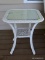 (BCK PRCH) WHITE WICKER END TABLE WITH GLASS PROTECTIVE TOP. MEASURES 22 IN X 22 IN X 24 IN. ITEM IS