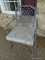 (FRNT PRCH) METAL OUTDOOR ARM CHAIR WITH GREEN UPHOLSTERED SEAT CUSHION. MEASURES 24 IN X 25 IN X 36