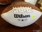 (BAS) AUTOGRAPHED FOOTBALL SIGNED BY JIM KELLEY AS WELL AS OTHER FOOTBALL STARS. ITEM IS SOLD AS IS