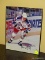(BAS) FRAMED AND AUTOGRAPHED PHOTO OF WAYNE GRETZKY. IS IN A BLACK FRAME AND MEASURES 8.25 IN X