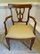 (DWN BED) MAHOGANY ARMCHAIR WITH CREAM UPHOLSTERED SEAT AND CARVED BACK SPLAT. HAS A STRETCHER BASE